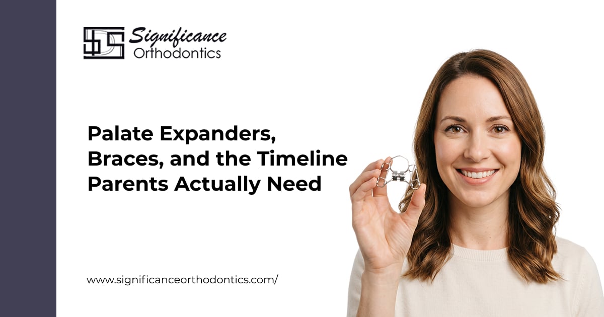 Smiling woman holding palate expander.