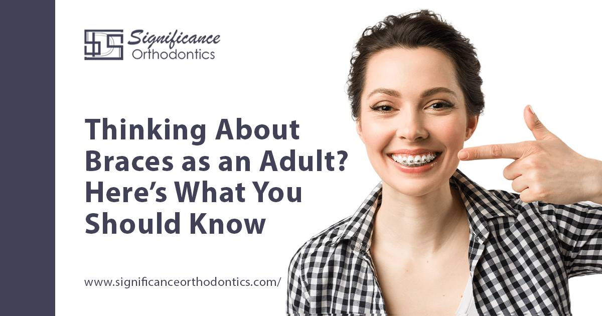 Thinking About Braces as an Adult? Here’s What You Should Know 3 wilckodontics smiling woman pointing at her adult braces